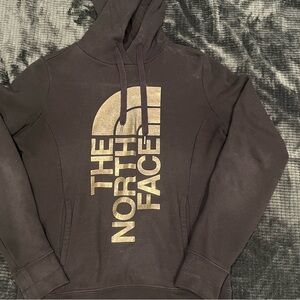The North Face Black Hoodie with Gold Logo